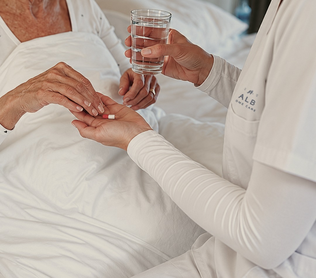 Caretaker providing person with medicine and water